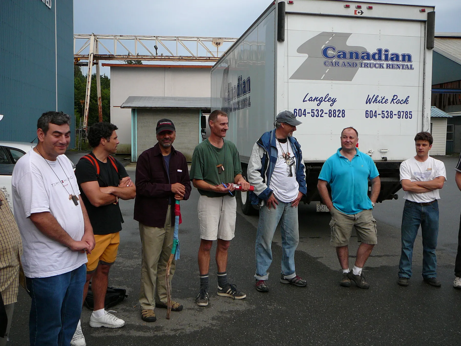 Production men in the lot before the trucks leave, 2006